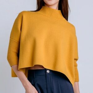 Kerisma AJA sweater in mustard yellow flowy and modern ribbed neck and sleeves